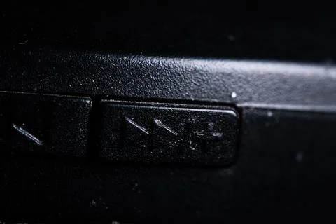 The forward and plus icon button is close on the device. Old and dirty Stock Photos