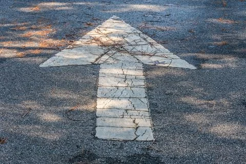 Forward arrow on the roadway Stock Photos