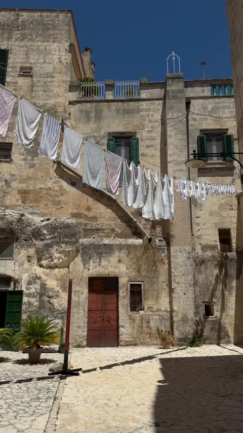 Forward Camera Move Through Matera Sassi Courtyard, Laundry Italy Stock Footage 336816428