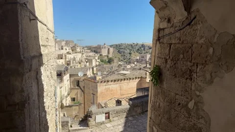 Forward Camera Move Through Stone Archway in Sassi di Matera, Italy, Cinematic Stock Footage 336674211