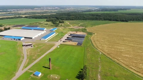 Forward descending drone view of farm silage pits Stock Footage 333278189