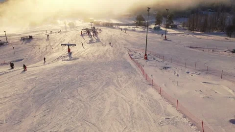 Forward descending drone view of snowy ski area Vidéo 322641745