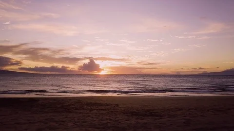 Forward Dolly Shot Of A Sunset Over A Tropical Beach Stock-Footage 83793839
