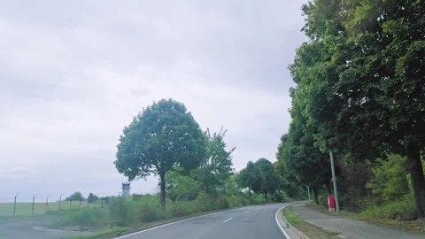 Forward Drive Along Empty Highway Between Green Trees Stock Footage 346037808