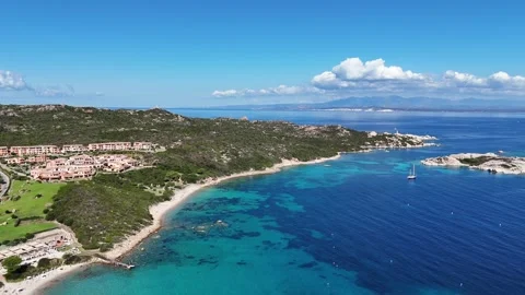 Forward Drone Flight Advancing Over Blue Bay Toward Coastline in Sardegn 库存影片 332787493