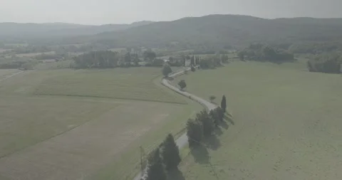 Forward Drone Flight Along Country Road Towards Tuscan Hills in Italy Stock-Footage 343932916