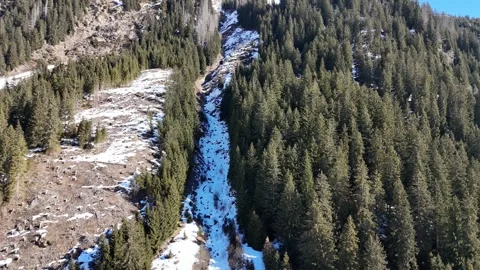 Forward Drone Flight Close to Snow-Covered Alpine Mountain Face Stock Footage 332124322
