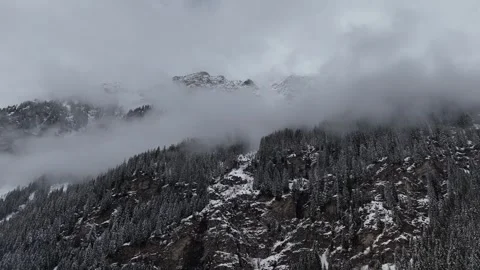 Forward Drone Flight Into Misty Snow-Covered Valley in South Tyrol, Ital Stock Footage 336476106