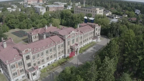 Forward drone flight near old building exterior Video stock 332600545