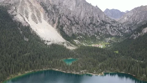 Forward Drone Flight Over Alpine Lake and Forest in Cuopu Valley China Video stock 330279522