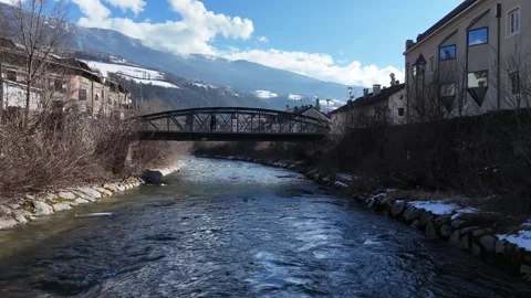 Forward Drone Flight Over Alpine River Toward Bridge in South Tyrol, Ita Vídeo Stock 335686146