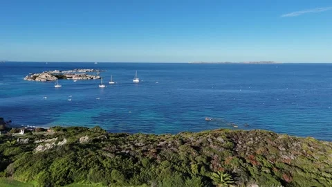 Forward Drone Flight Over Coastal Landscape Toward Deep Blue Horizon in Vídeo Stock 333052242