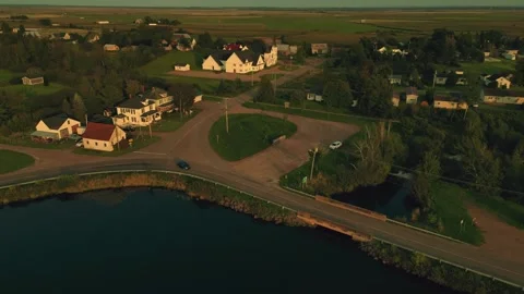 Forward Drone Flight Over A Lake Toward A Roadway And Residential Property Stock-Footage 255310781