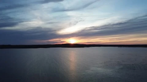 Forward Drone Flight Over a Lake at Sunset Stock Footage 312237872