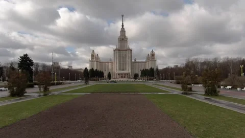 Forward drone flight over park to historic building Video stock 323576048