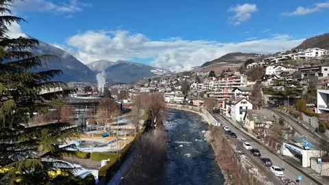 Forward Drone Flight Over River Toward Bressanone Town at 20m Altitude, Vídeo Stock 335838415