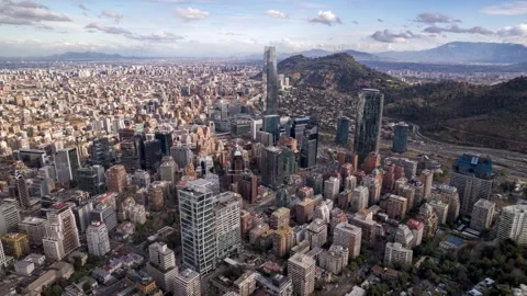 Forward drone flight over Santiago skyline with Costanera Center Stock Footage 310795406