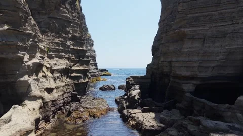 Forward Drone Flight Through Cliffs at Ubara Risokyo in Chiba Japan – 4K Stock Footage 321984460