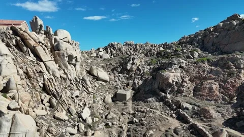 Forward Drone Flight Through Rocky Canyon in Capo Testa, Sardegna Stock Footage 332353815