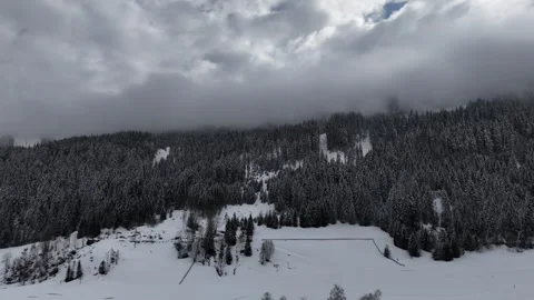Forward Drone Flight Toward Snowy Mountain Under Cloudy Sky in South Tyr Vídeo Stock 336652453