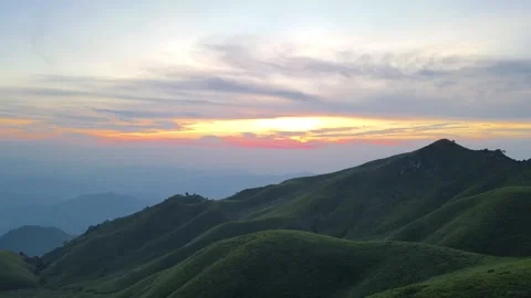 Forward Drone Flight Toward Sunrise Above Grass Ridge Wugong Mountain China Video stock 330286556