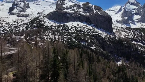 Forward Drone Flight Towards Massive Snowy Mountain Massif in the Dolomi Video stock 339381252