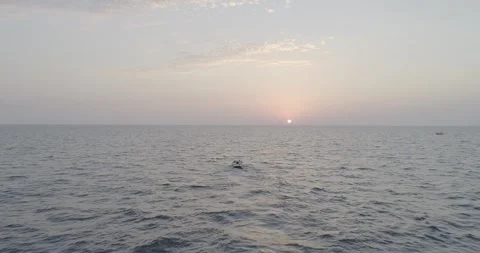 Forward Drone Fly-Through Past Couple in Boat at Sunset, Sochi, Russia Vídeo Stock 344008181