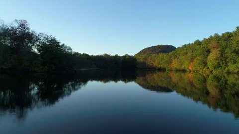 Forward drone flyover lake at 60 frames per second Video stock 83249925