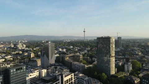 Forward drone glide toward Frankfurt television tower skyline Stock Footage 331880926