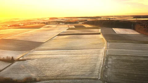 Forward Drone Over Frosty Patchwork Fields at Golden Hour 4K 스톡 동영상 328082244