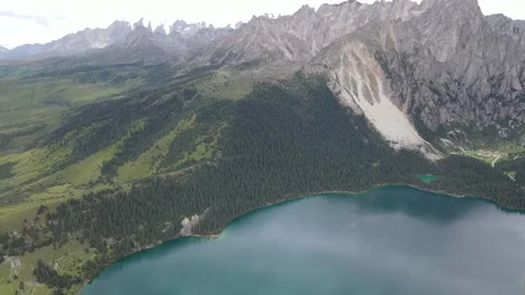 Forward Drone Push Toward Alpine Lake in Cuopu Valley Sichuan China Stock Footage 330279945