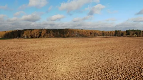 Forward drone shot above rural farmland Stock Footage 323461122