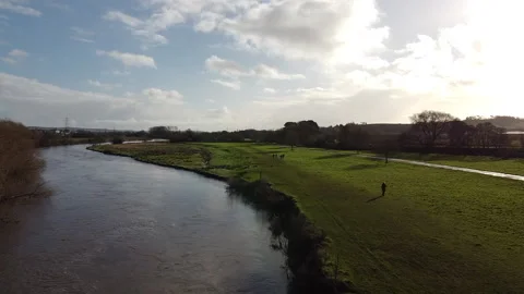 Forward drone shot along the River Exe by Double Locks Stock Footage 151296916