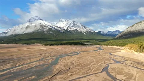 Forward drone shot of river delta at Abraham Lake Stock Footage 337347285