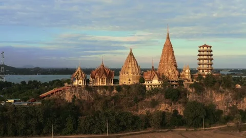 FORWARD DRONE SHOT OF WAT THAM SUEA DURING SUNSET IN THAILAND (BUDDHIST TEMPLE) Stock Footage 169160717