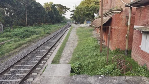 Forward Drone View Along Railway Tracks at Bangladesh's First Railway Station Stock Footage 344089003