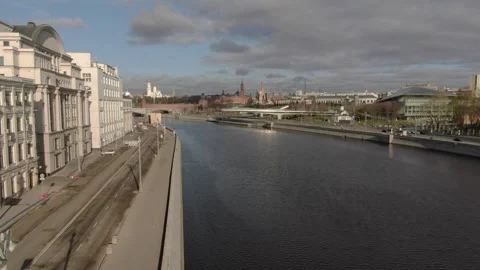 Forward drone view over river and urban promenade Stock Footage 322800278