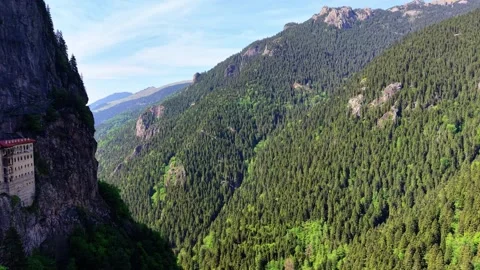 Forward Flight Along Forested Cliff with Sumela Monastery on the Left 스톡 동영상 340428353