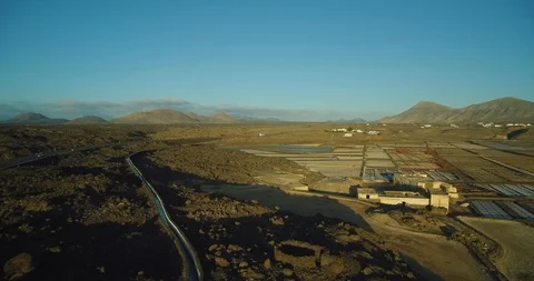 Forward Flight Dolly Drone Shot Over Salt Fields In Lanzarote Stock Footage 119698878