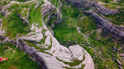 Forward Flight Into a Dramatic Canyon of Giant Monolithic Rock Formations Stock-Footage 341228523