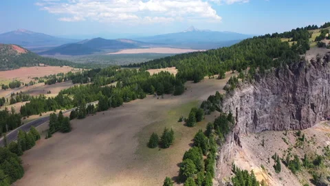 Forward flight over the edge of a rocky clif Stock Footage 152546398