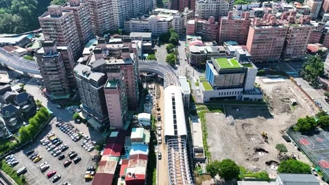 Forward Flight over Taiwan Metro Subway Station Train Stock Footage 218347792