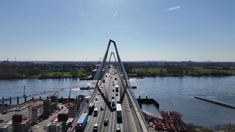 Forward flight through bridge structure with traffic below Stock Footage 331200985