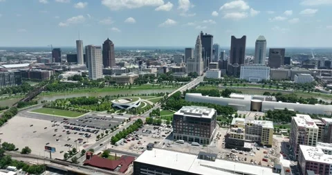 Forward flight viewing downtown tall buildings and parks along the river Video stock 335672029