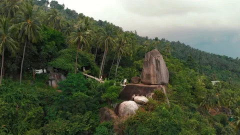 Forward fly to a huge stone with a Overlap Stone viewpoint on the Lamai, Thai Stock Footage 229677506