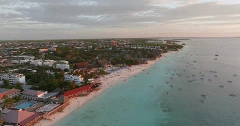 Forward Flying Drone Shot Over Nungwi Public Beach at Sunset, Zanzibar Vídeo Stock 327414166