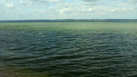 Forward flying over the Baltic Sea coast in Northern Germany in summer Stock Footage 158998199