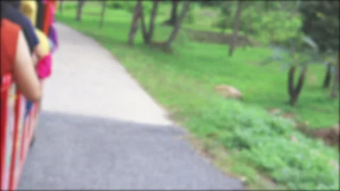 Forward journey on a forest road in blurred green natural background. Stock Footage 151591797