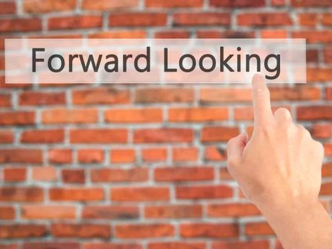 Forward Looking - Hand pressing a button on blurred background concept on vis Stock Photos