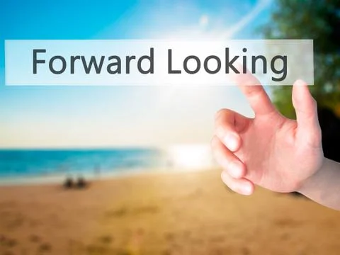 Forward Looking - Hand pressing a button on blurred background concept on vis Stock Photos